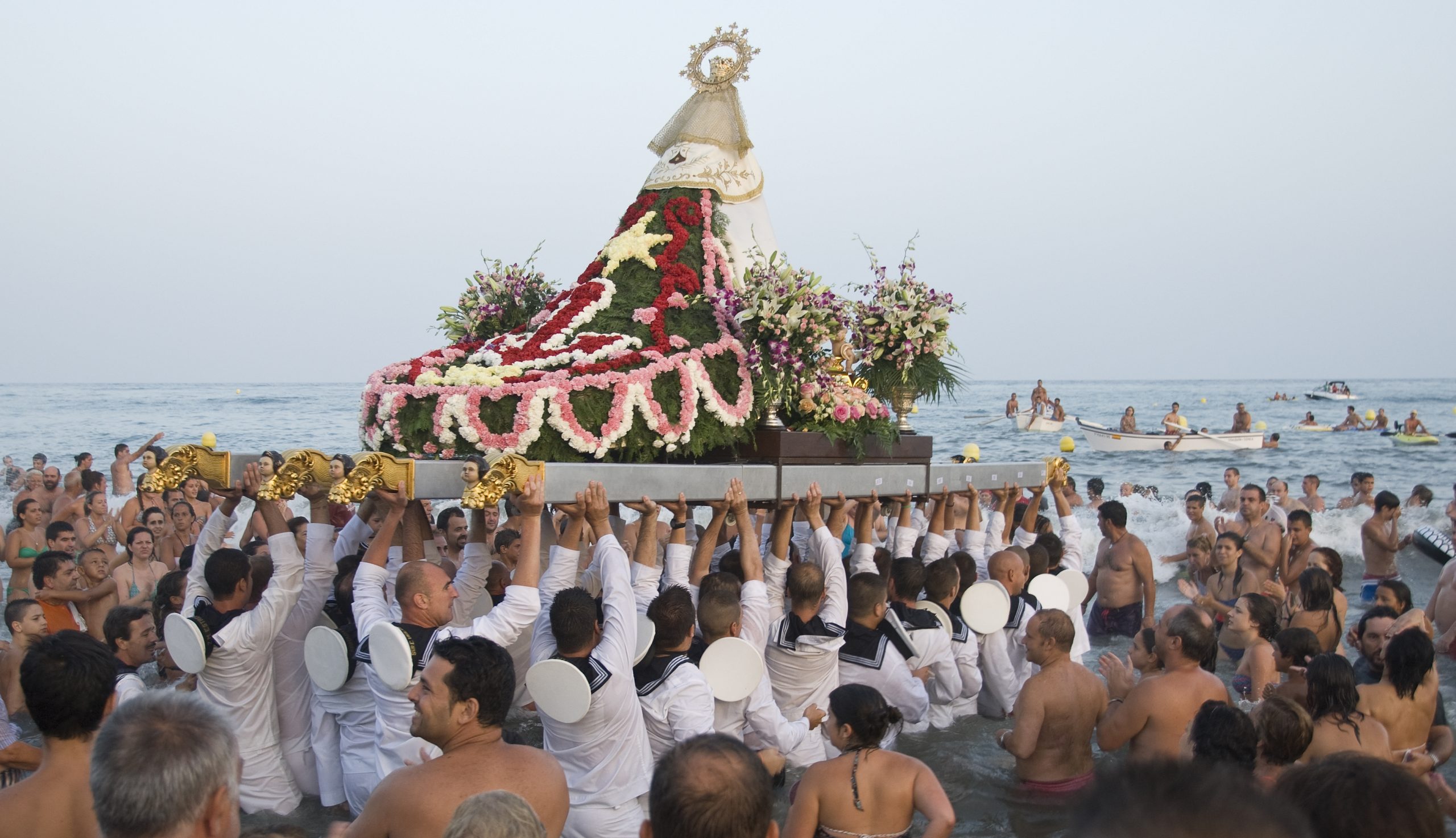 Malaga,,Spain,-,July,16:,Unidentified,Local,Worshipers,Lift,A