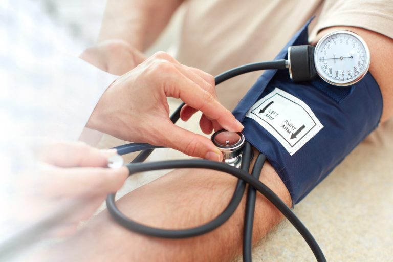 Man,Measuring,His,Blood,Pressure.