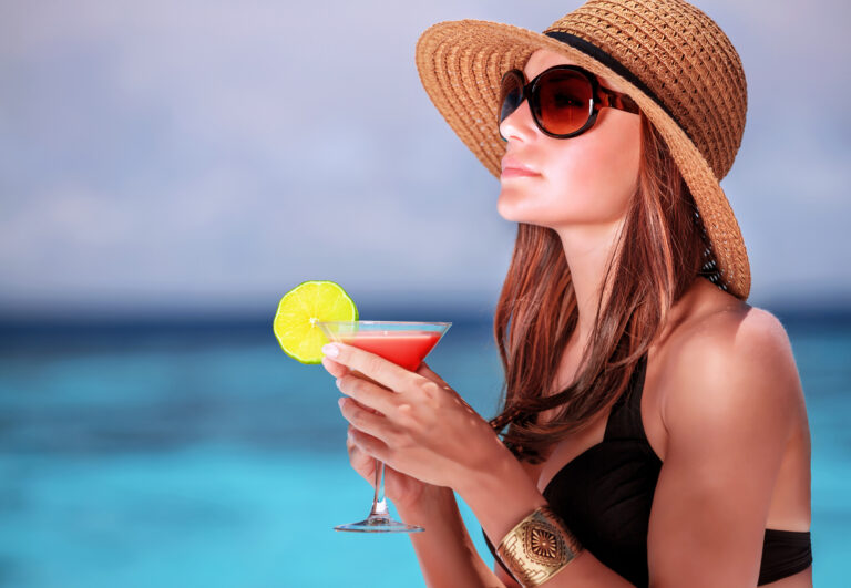 Portrait,Of,Stunning,Woman,Wearing,Stylish,Beach,Hat,And,Sunglasses