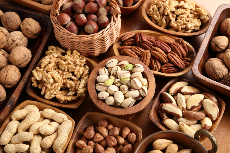 A,Variety,Of,Nuts,In,Wooden,Bowls.