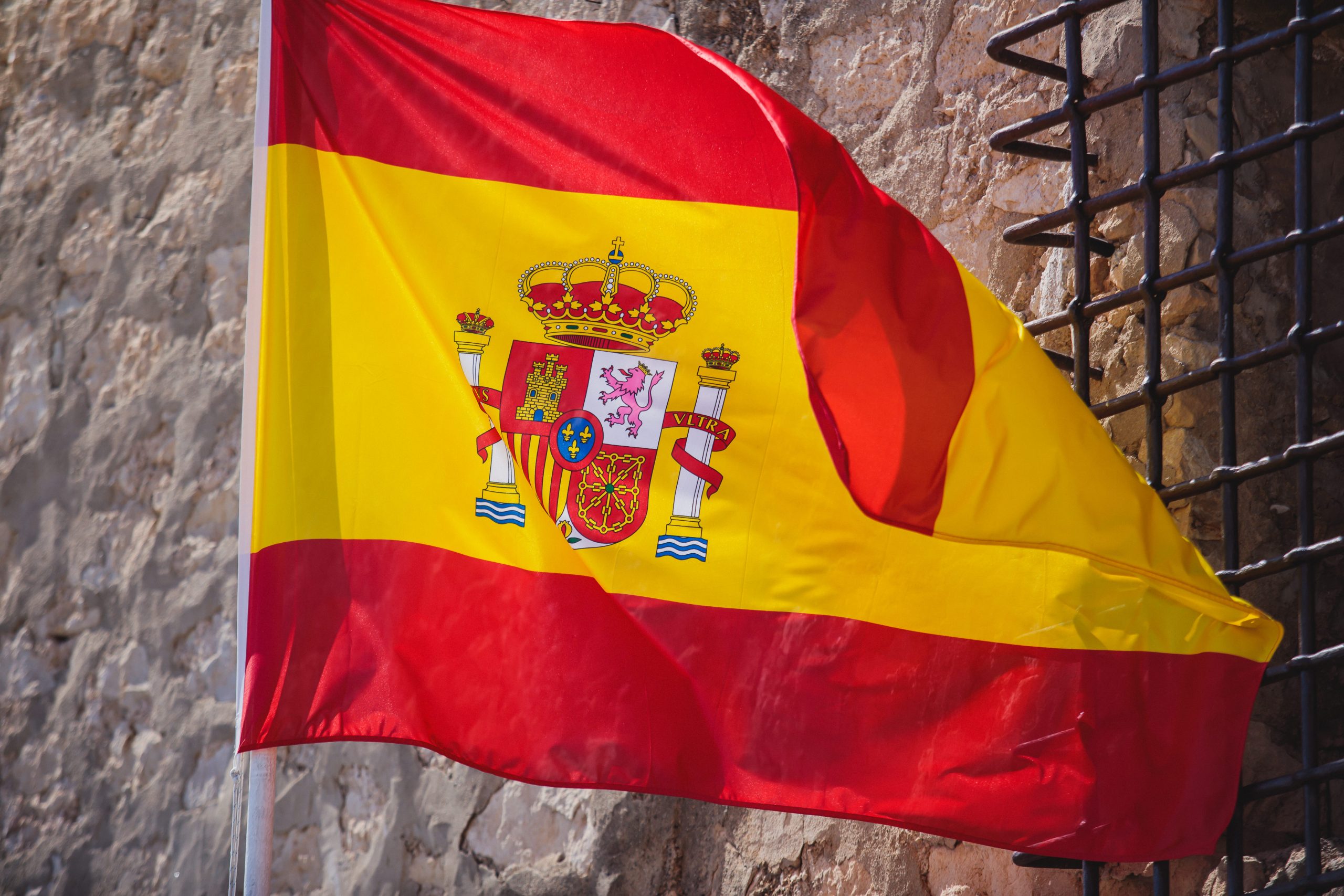 Waving,Flag,Of,Spain,Hanging,On,The,Kingdom,Of,Spain