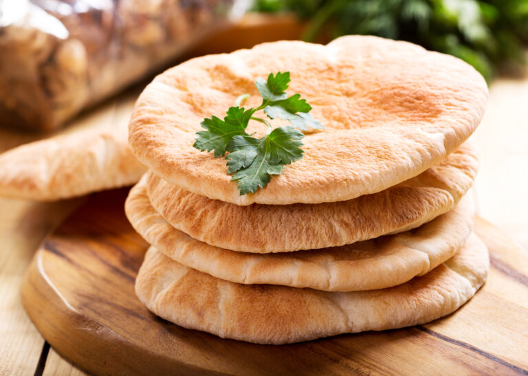 Pita,Bread,On,Wooden,Board
