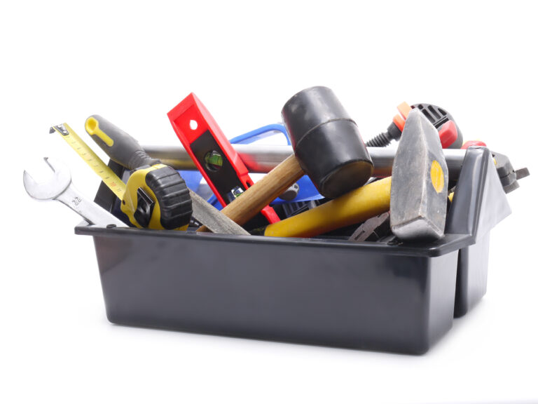 Plastic,Black,Toolbox,With,Tools,Over,White,Background